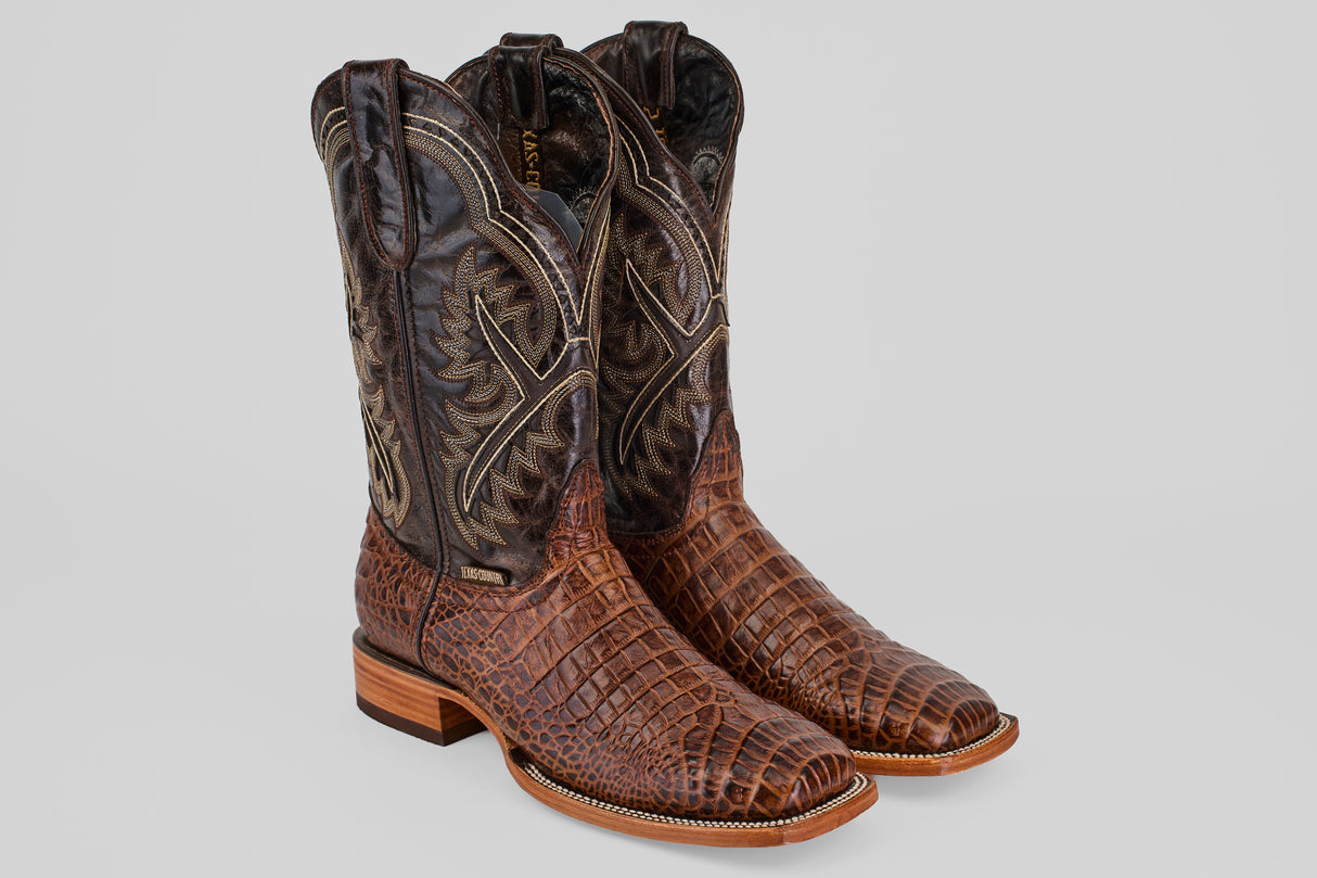 The Caiman Belly Choco - Embossed Leather - Square Toe (E423) boots feature brown, square toes, a textured caiman-like pattern on the foot, and intricate stitching on dark brown embossed leather shafts.