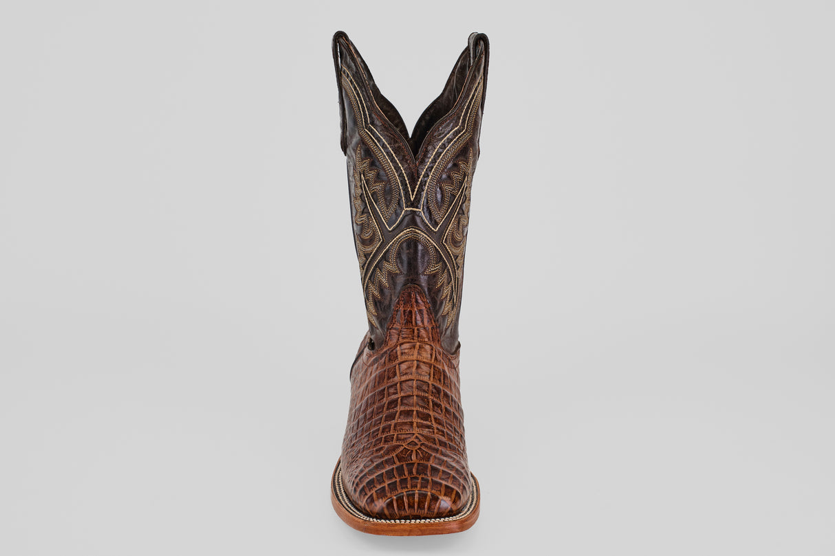 The Caiman Belly Choco - Embossed Leather - Square Toe (E423) boot features a brown alligator-style embossed foot and detailed stitching on the tall shaft, displayed from the front on a plain light background.