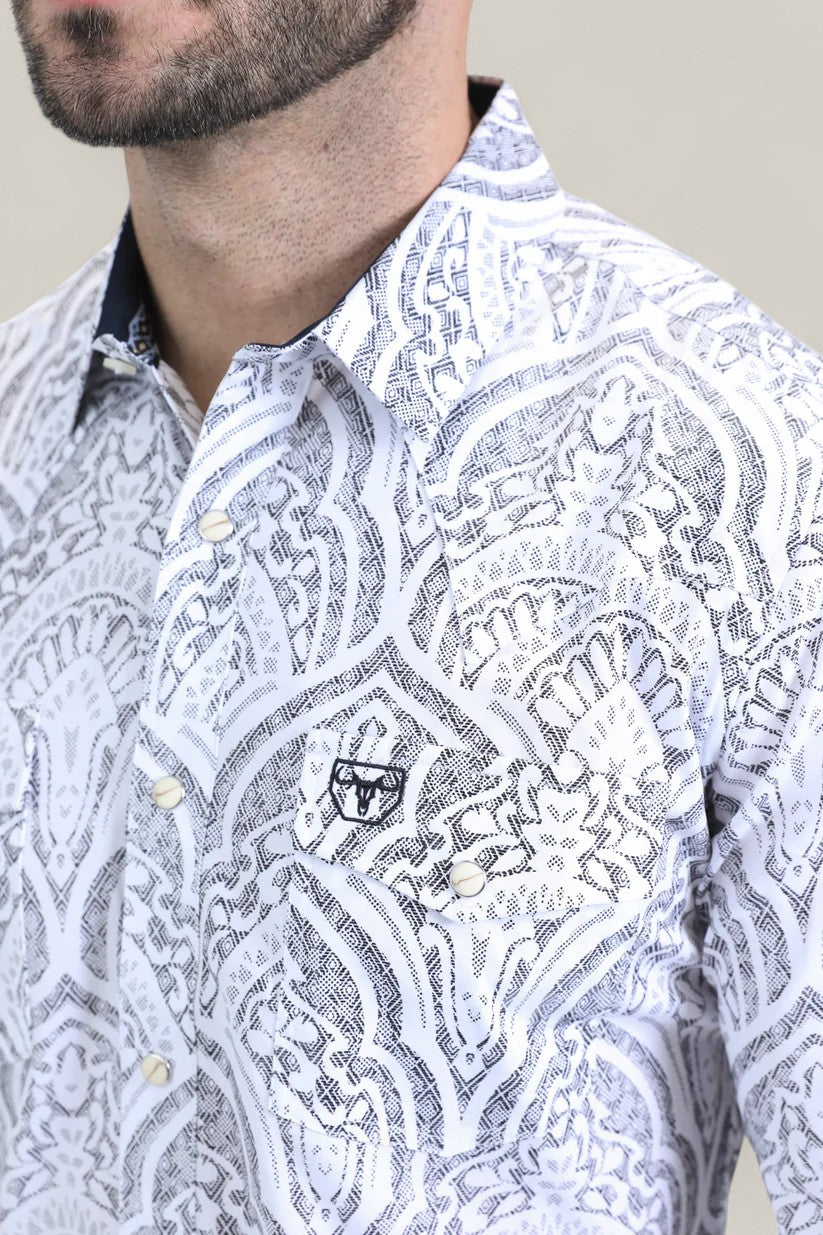 Close-up of a man wearing the Mens Western Modern Fit Cotton/Spandex Long Sleeve White Shirt with Snaps (WPL10822). The shirt is white with an abstract black and gray pattern; only his lower face and upper torso are shown.