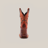 Positioned against a white background, the Azkar Moka Square Toe cowboy boot in brown features decorative stitching on the shaft and a square toe, crafted from premium materials with intricate patterns in darker leather tones.